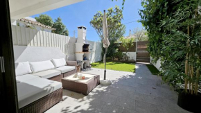 Magnific Studio with a cozy garden, 5 minutes to the beach